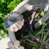 Various garden spike designs as ornamental additions to a garden.