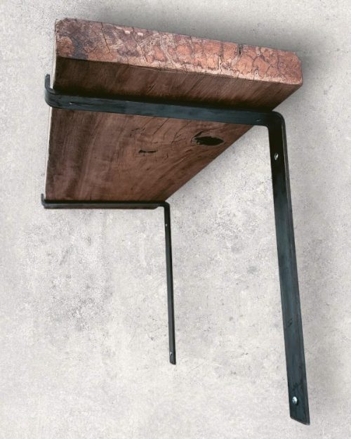 Side view of an industrial style steel bracket with lipping.